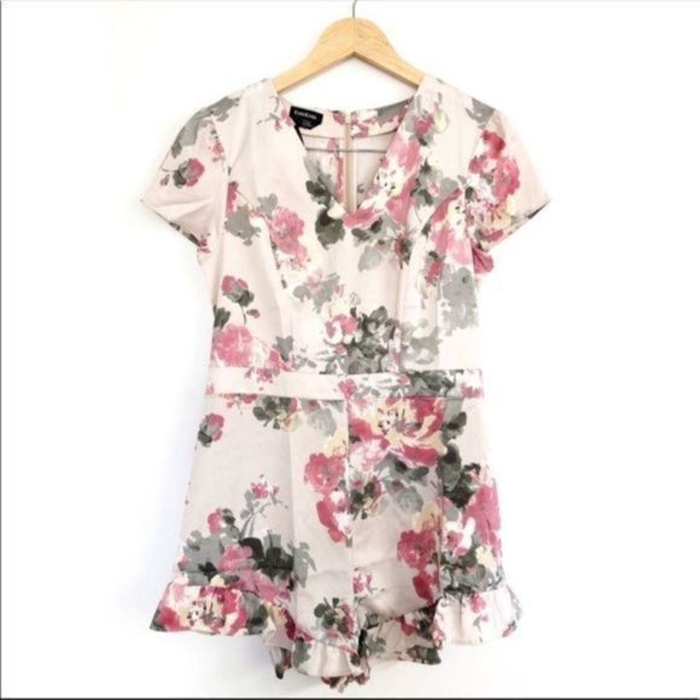 Bebe Floral romper new with tags Size 8